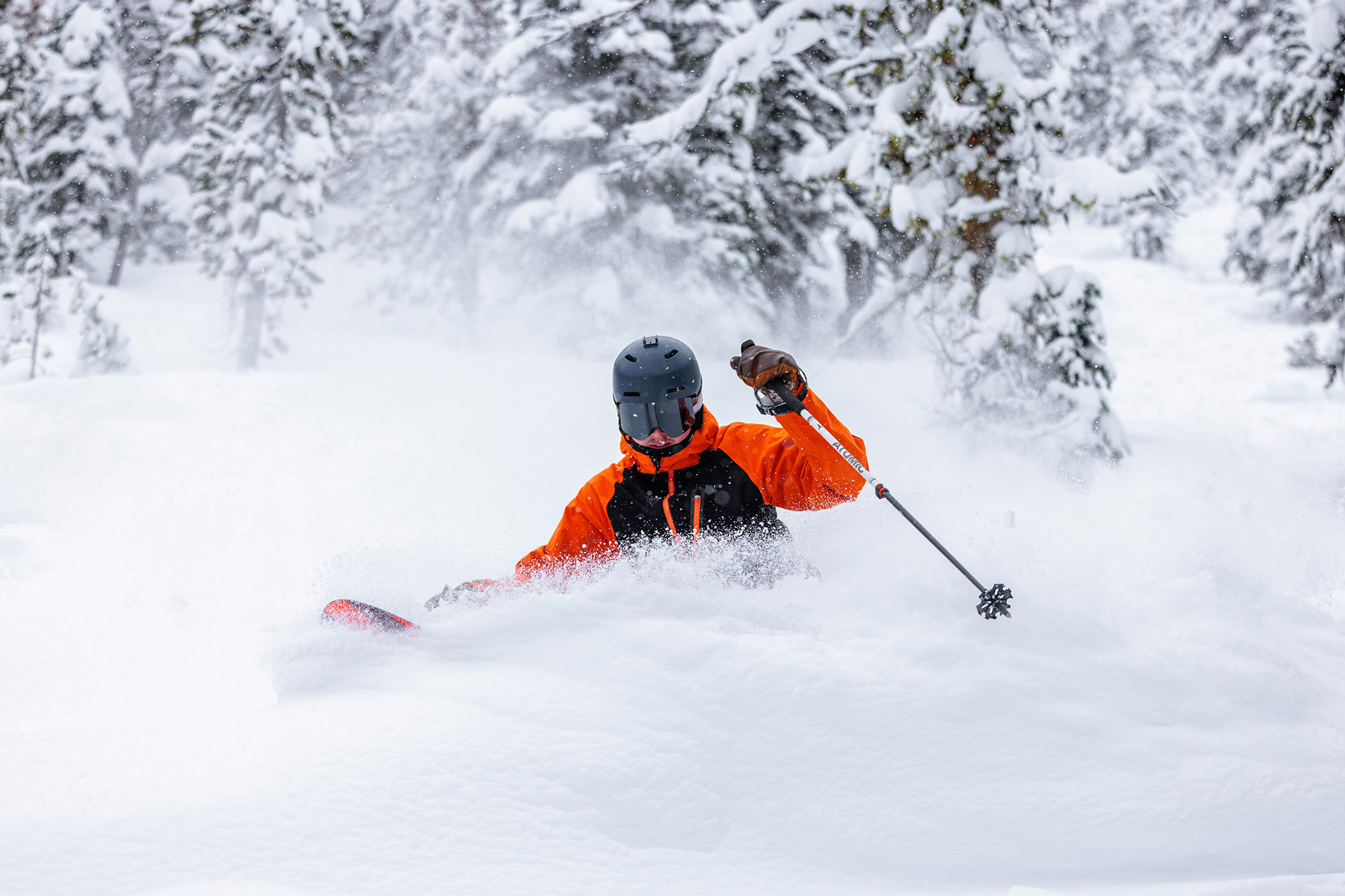 skier enjoys some deep powder at Lost Trail Ski Area.